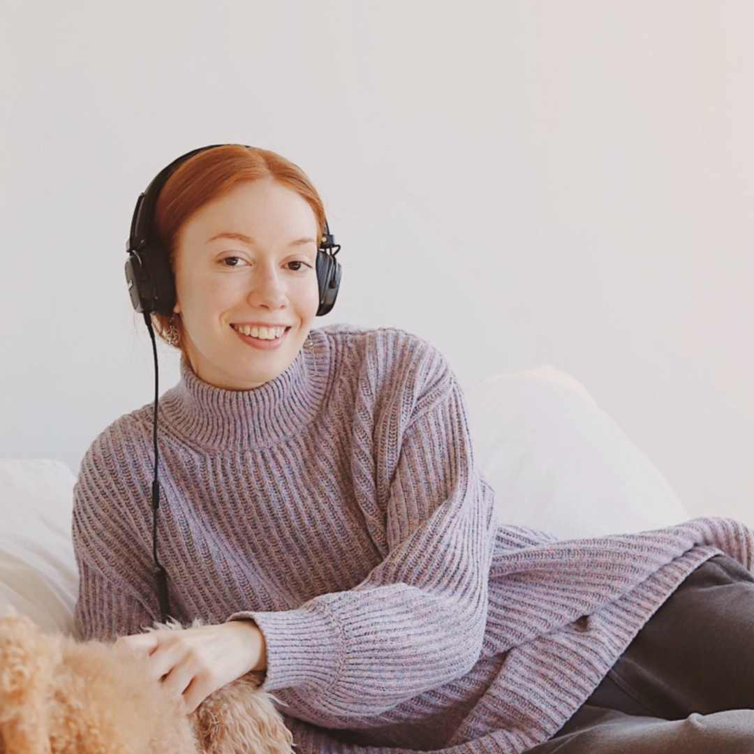 relaxed woman listening to hypnosis recording